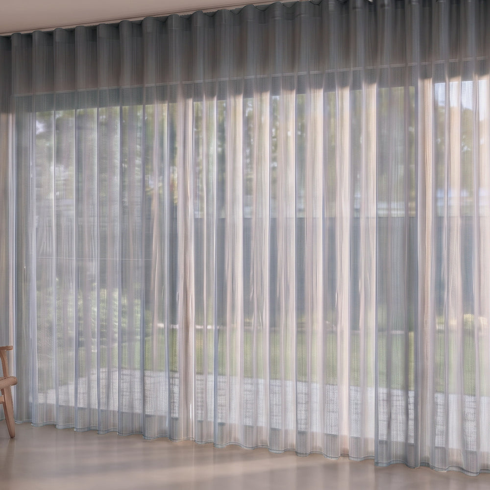 Antipodes Sheer Curtain in Pacific, S-fold on a ceiling track