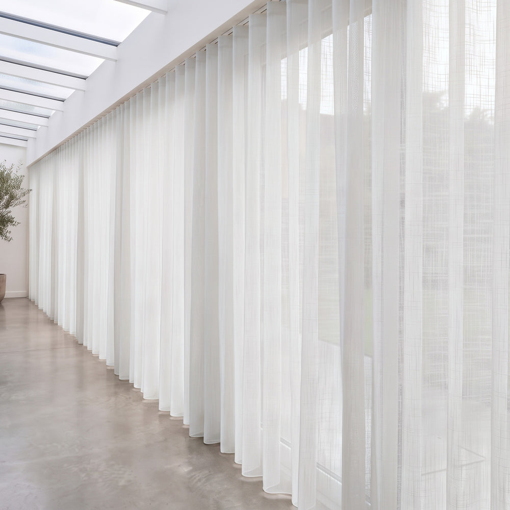Astra Sheer Curtain in Ivory, S-fold on a ceiling track