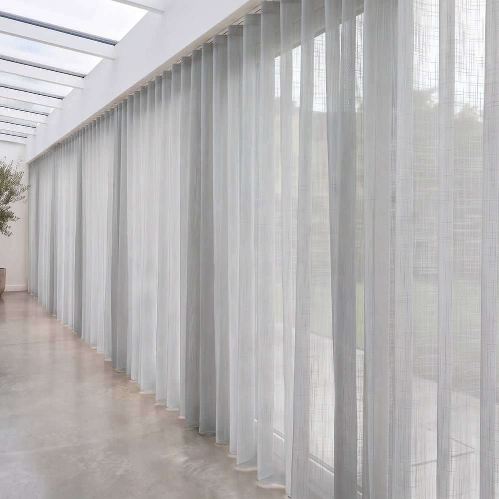 Astra Sheer Curtain in Lunar, S-fold on a ceiling track