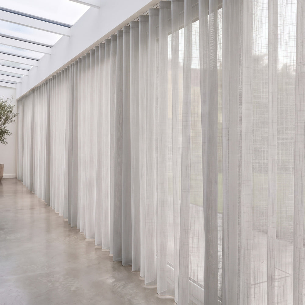 Astra Sheer Curtain in Stone, S-fold on a ceiling track