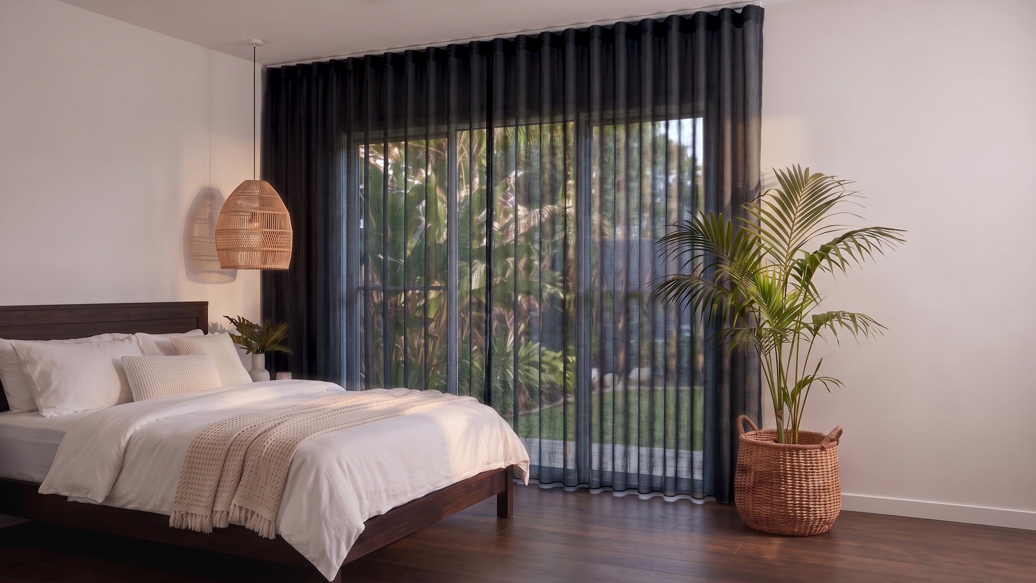 Bali Sheer Curtain in Black, S-fold on a ceiling track