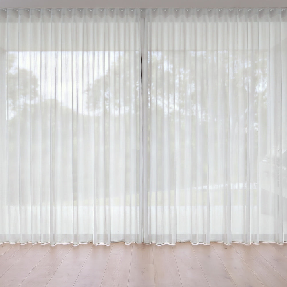 Blythe Sheer Curtain in Milk, S-fold on a ceiling track