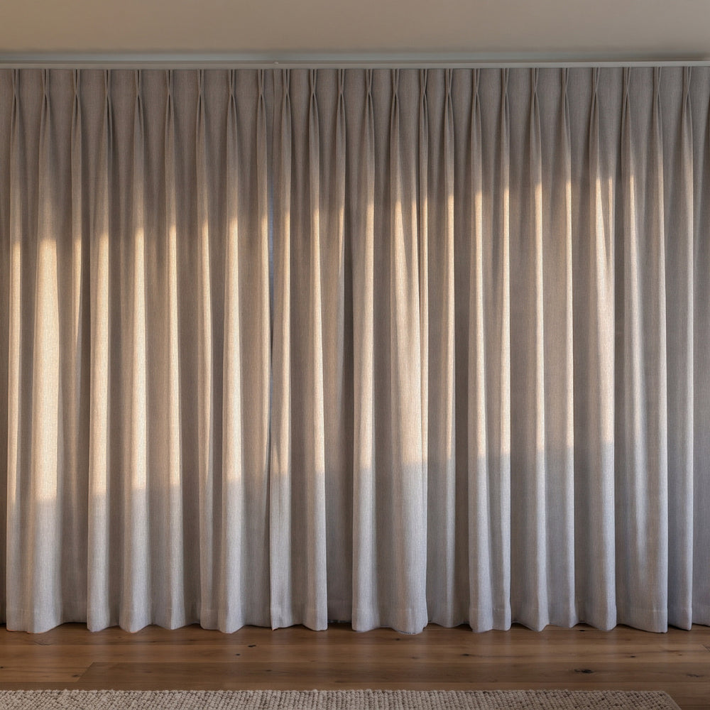 Breakaway Blockout Curtain in Ash, twin pleat on a ceiling track