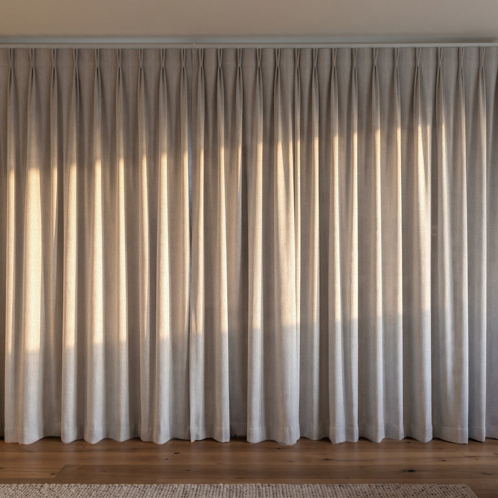 Breakaway Blockout Curtain in Mist, twin pleat on a ceiling track
