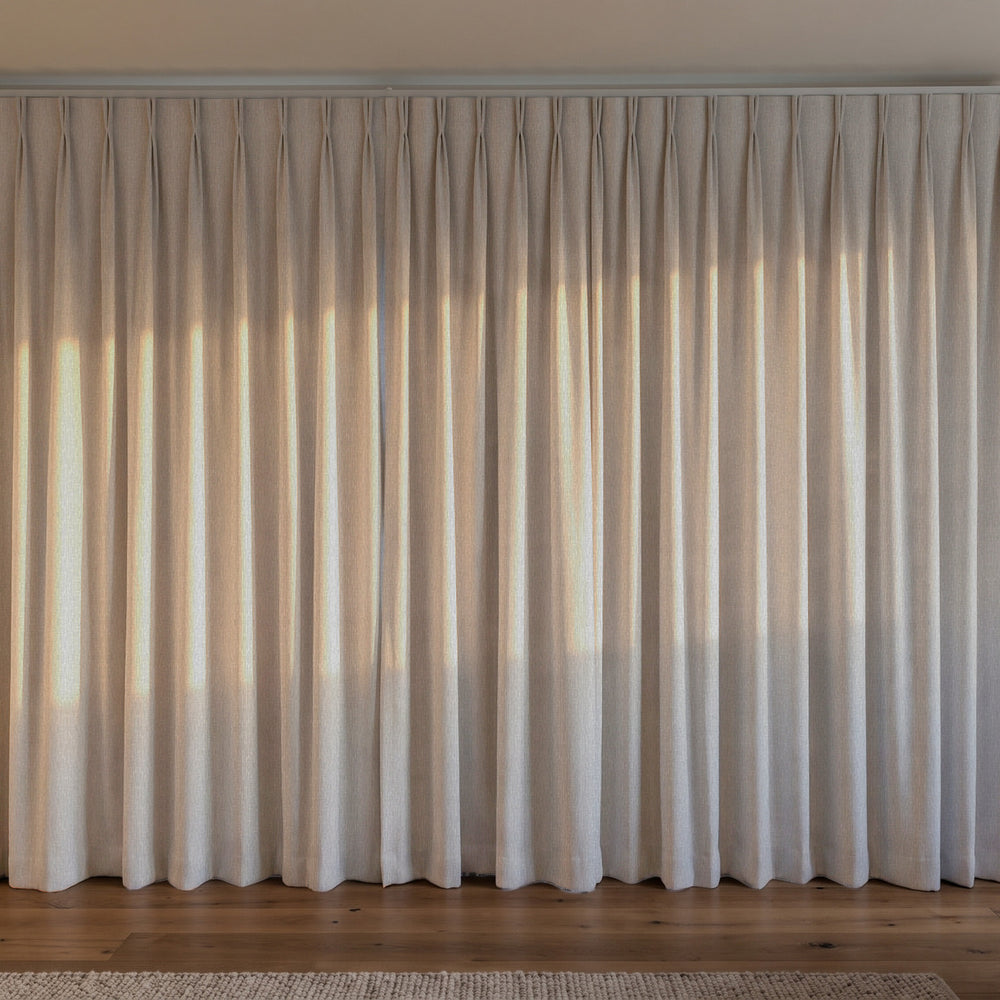 Breakaway Blockout Curtain in Parchment, twin pleat on a ceiling track