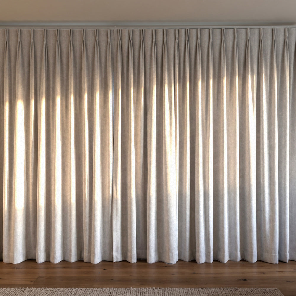Breakaway Blockout Curtain in Snow, twin pleat on a ceiling track