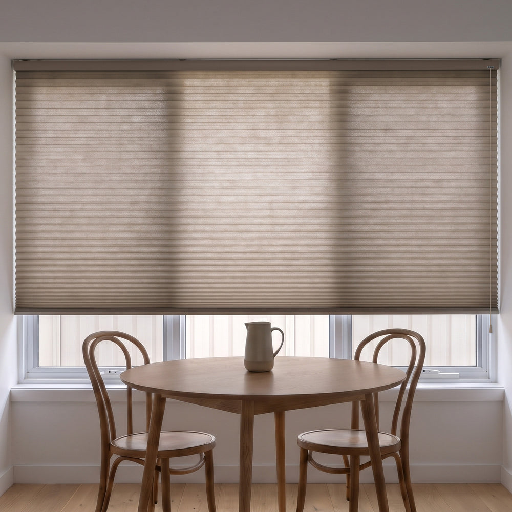 Honeycomb Light Filtering Corded Blind in Fawn, recess fitted in a kitchen dining nook window