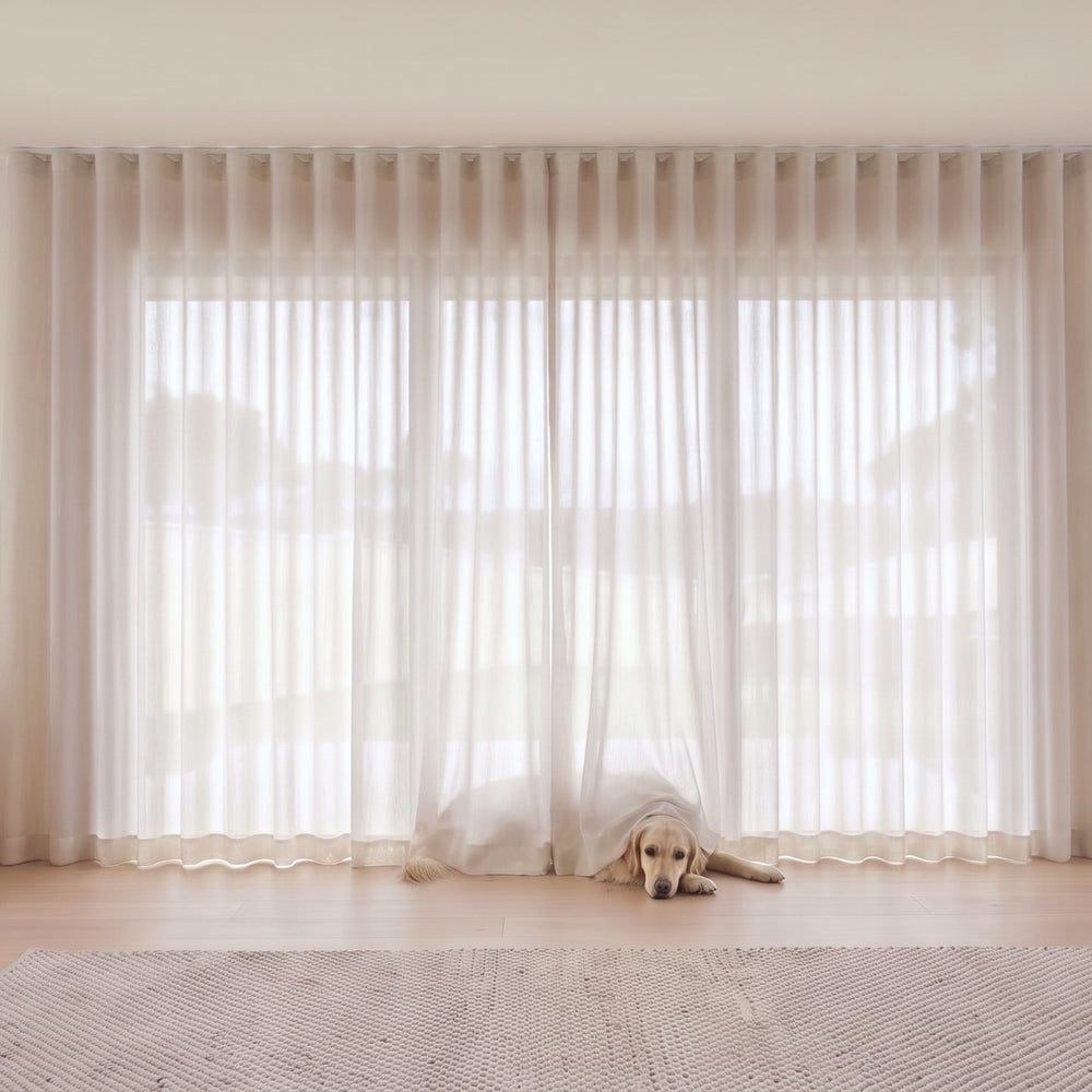 Cloud Sheer Curtain in Sandshell, S-fold on a ceiling track