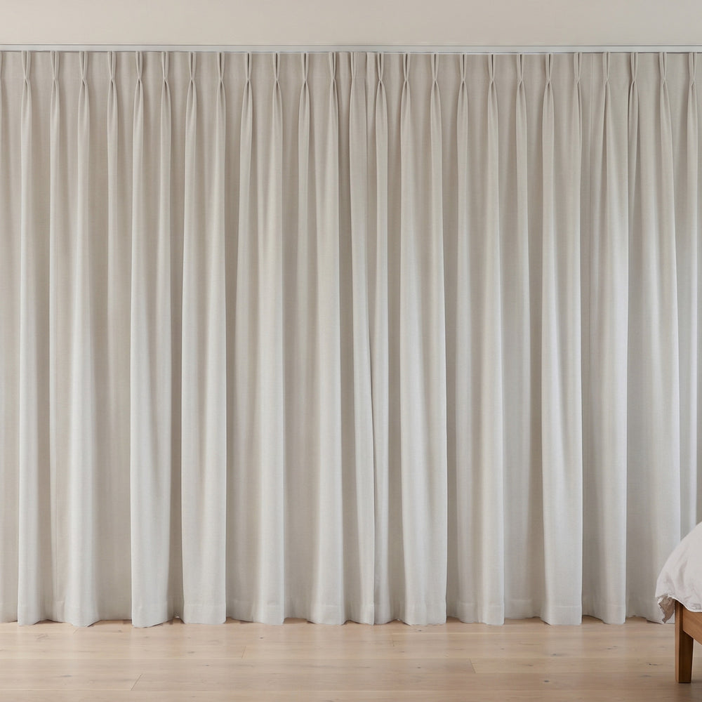 Flannery Blockout Curtain in Chalk, twin pleat on a ceiling track