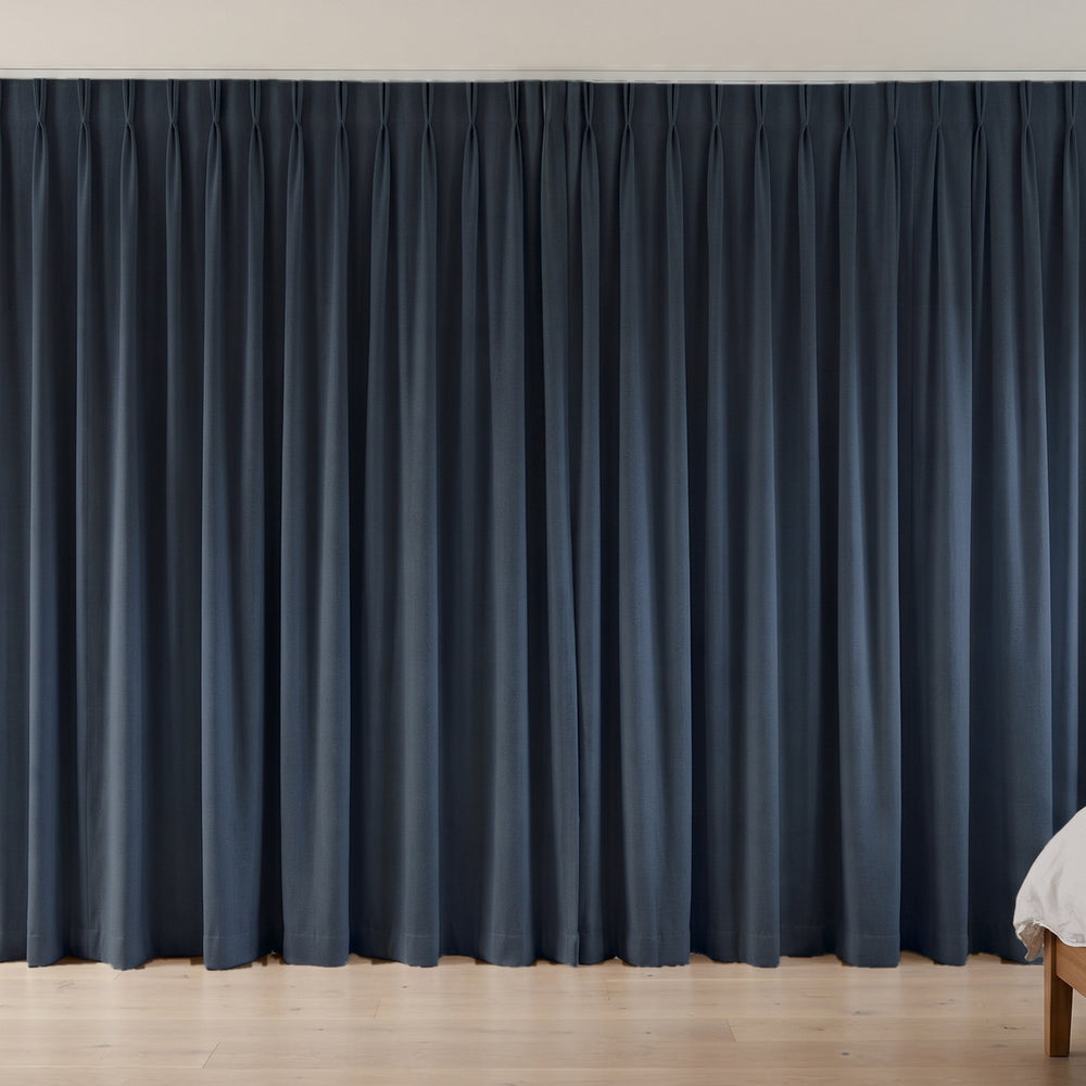 Flannery Blockout Curtain in Ink, twin pleat on a ceiling track