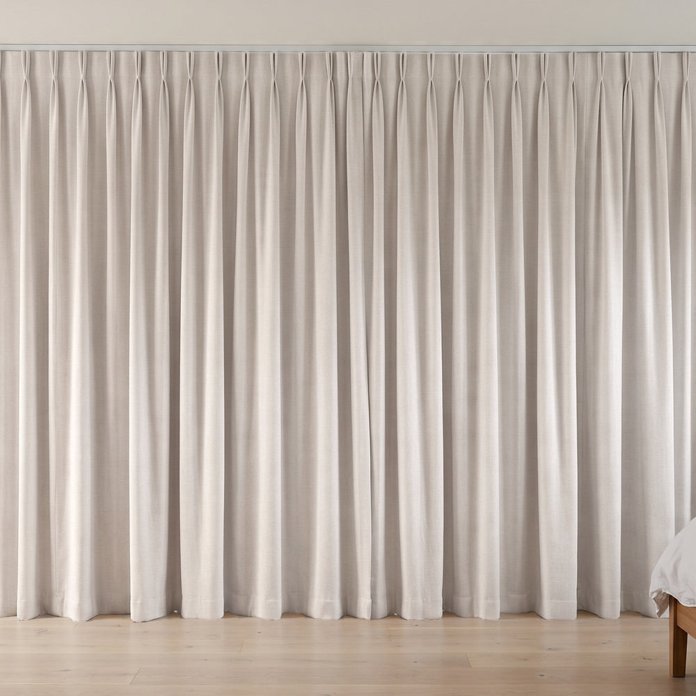 Flannery Blockout Curtain in Natural, twin pleat on a ceiling track