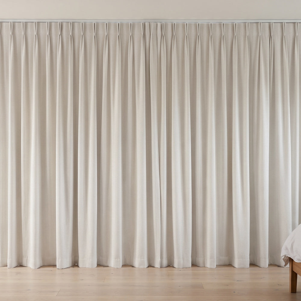 Flannery Blockout Curtain in Parchment, twin pleat on a ceiling track