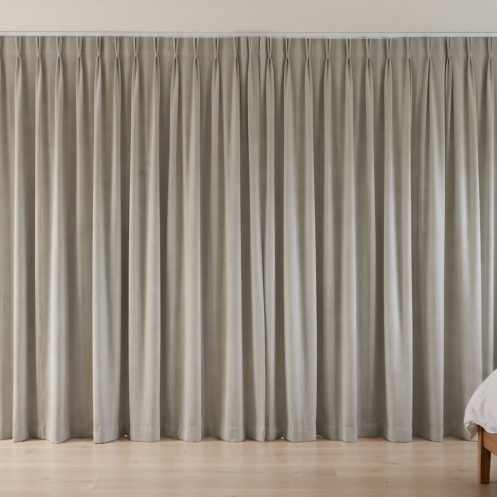 Flannery Blockout Curtain in Stone, twin pleat on a ceiling track