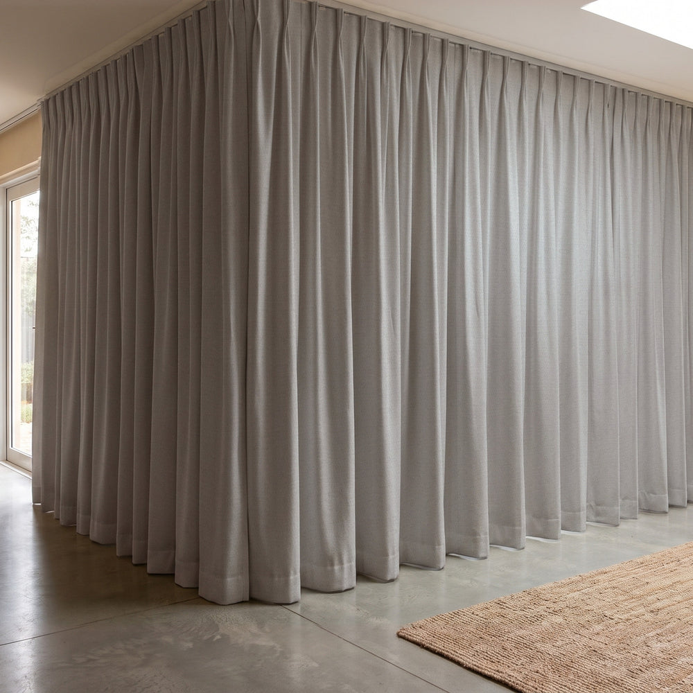 Galaxy Blockout Curtain in Astra, twin pleat on a ceiling track