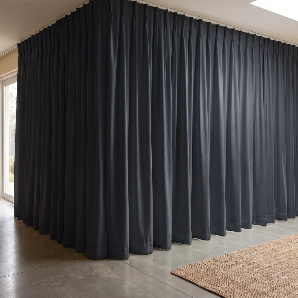 Galaxy Blockout Curtain in Neutron, twin pleat on a ceiling track