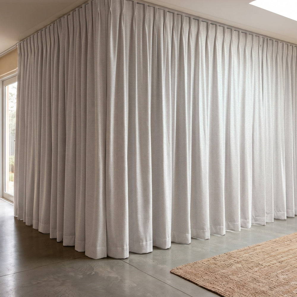 Galaxy Blockout Curtain in Polar, twin pleat on a ceiling track