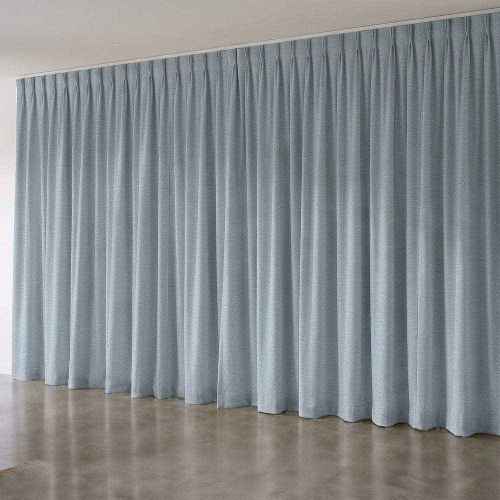 Harris Blockout Curtain in Marine, twin pleat on a ceiling track
