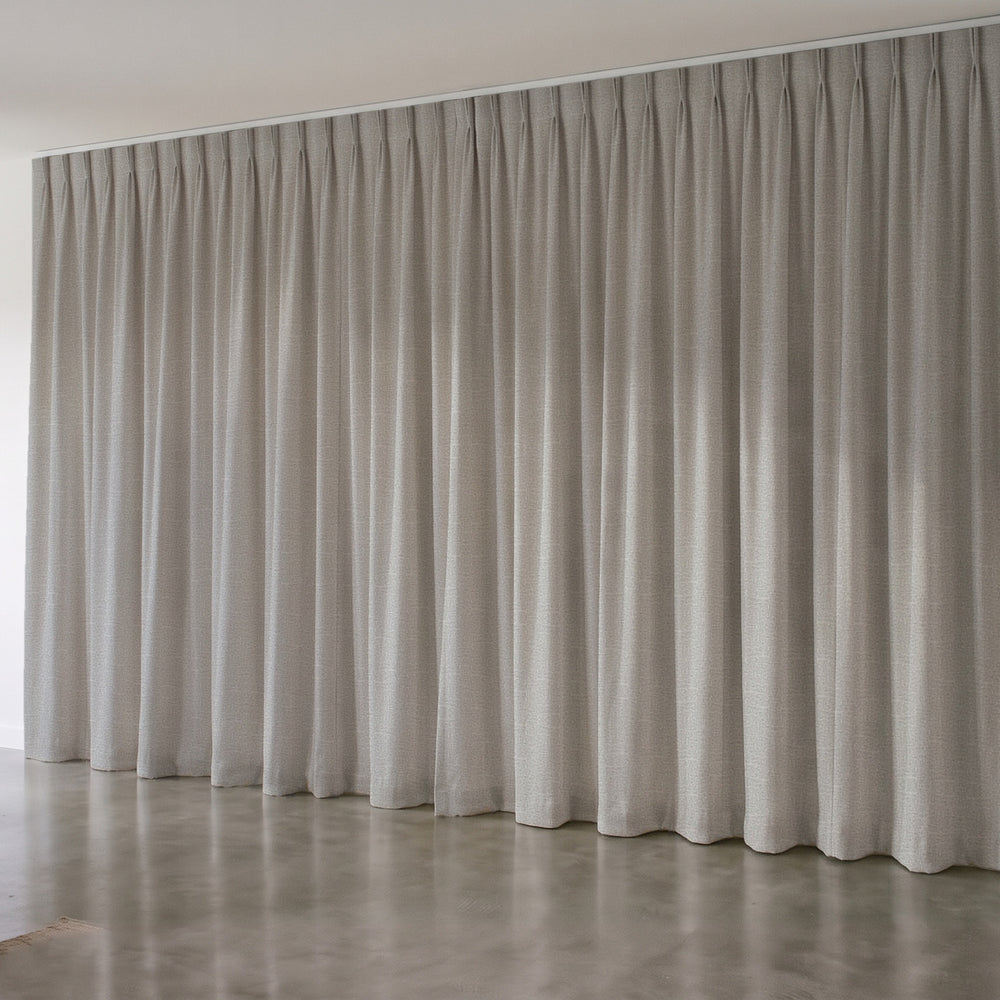 Harris Blockout Curtain in Natural, twin pleat on a ceiling track