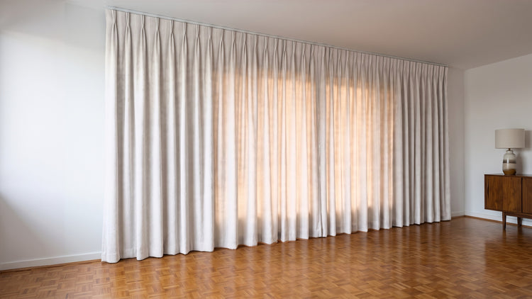 Havana Unlined Curtain in Ecru, twin pleat on a ceiling track