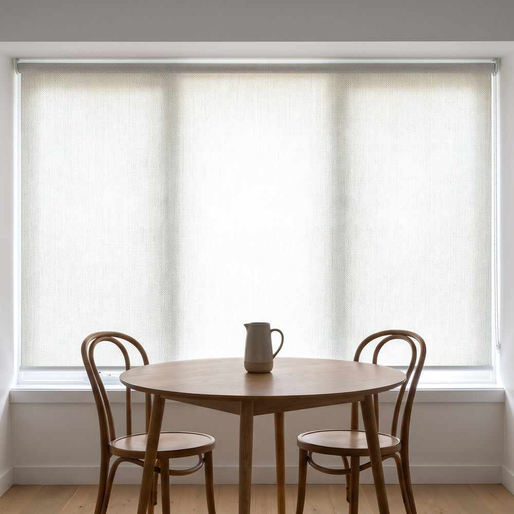 Jersey Light Filtering Roller Blind in Willow, recess fitted in a kitchen nook window
