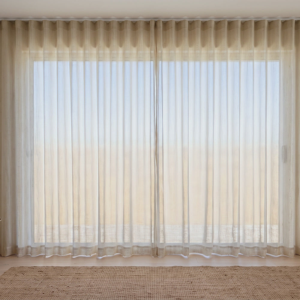 Lamu Sheer Curtain in Bone, S-fold on a ceiling track