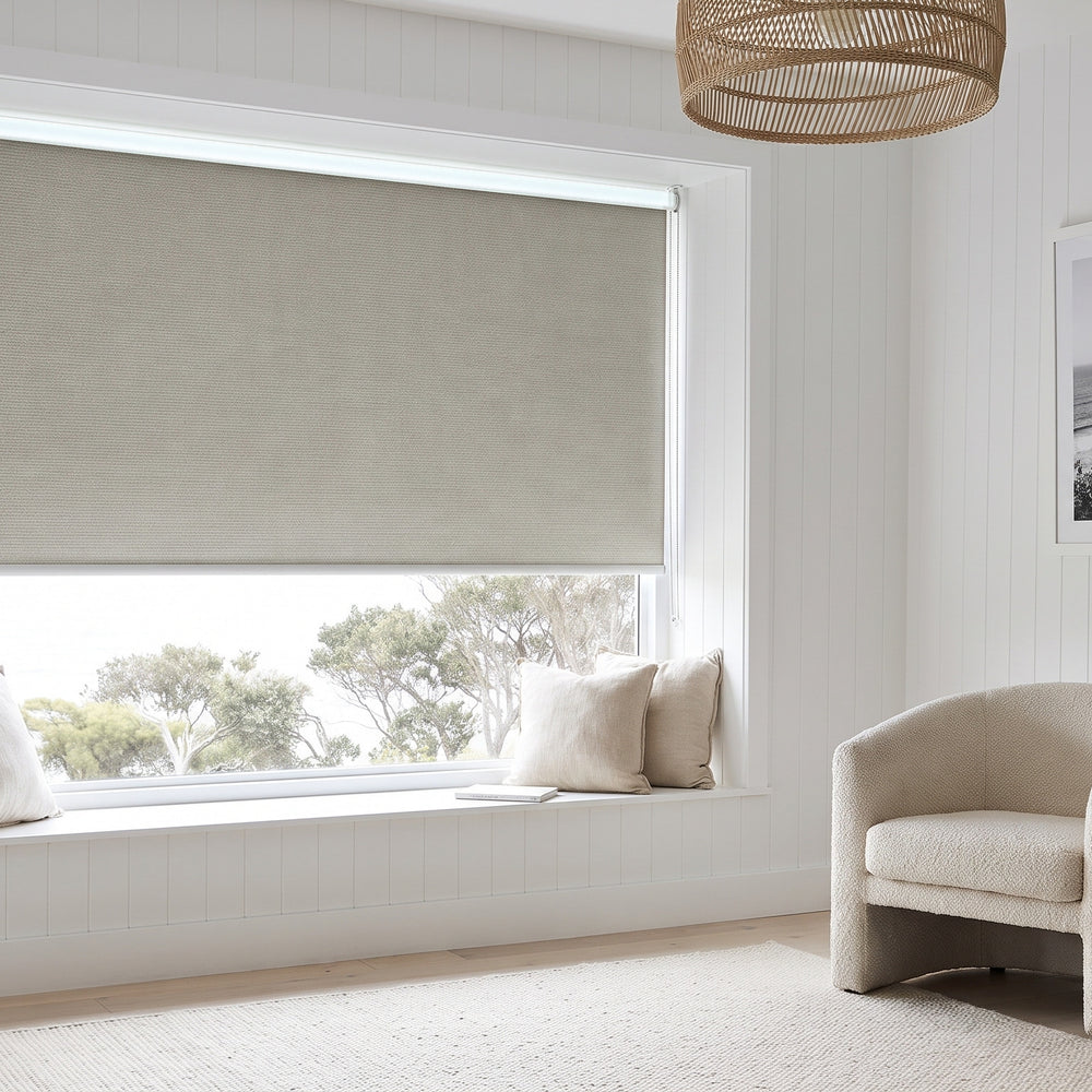 Linesque Blockout Roller Blind in Almond, recess fitted in a living room window