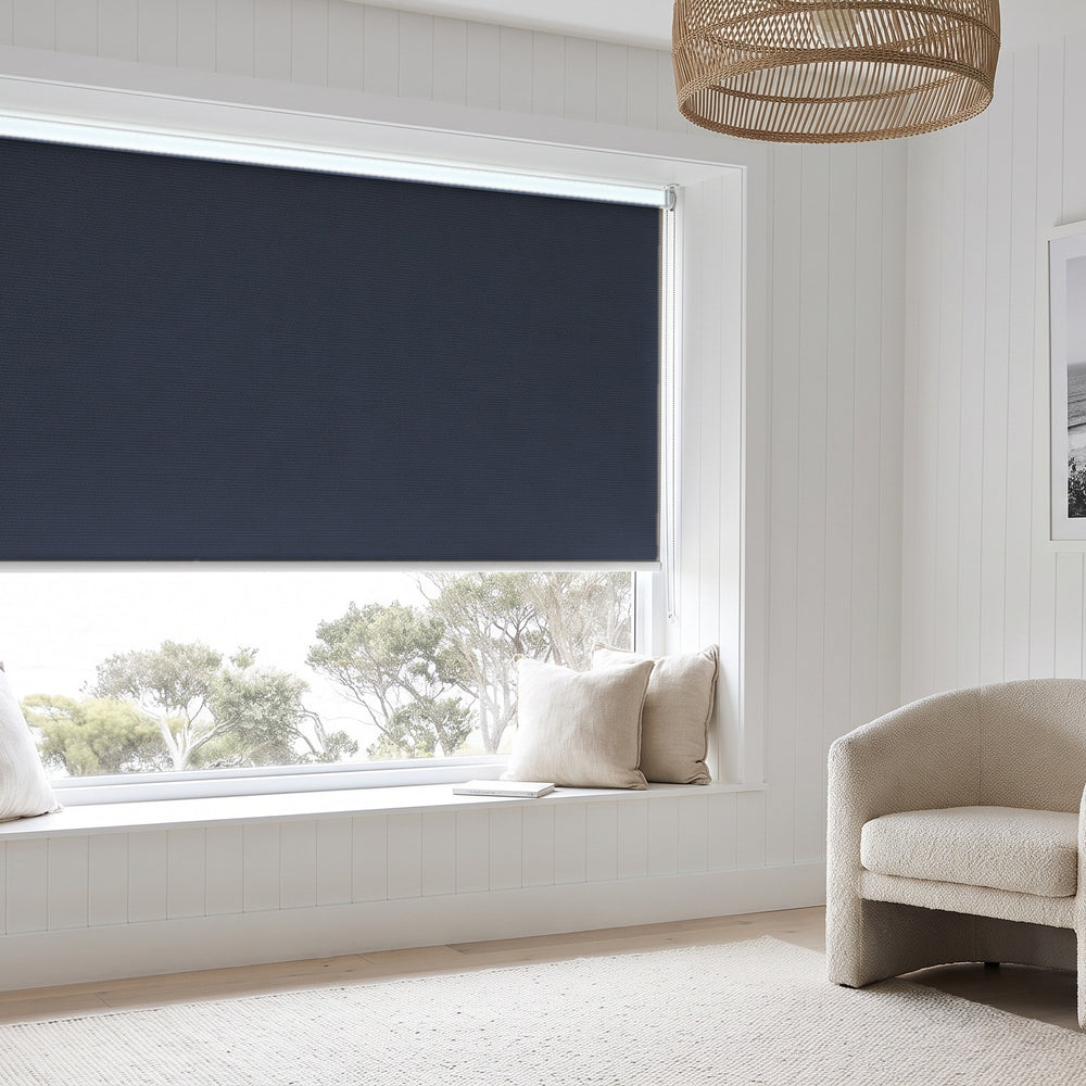 Linesque Blockout Roller Blind in Denim, recess fitted in a living room window