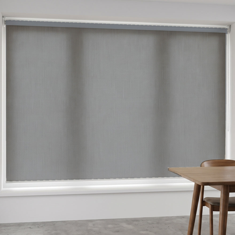 Linesque Light Filtering Roller Blind in Delta, recess fitted in a dining room window