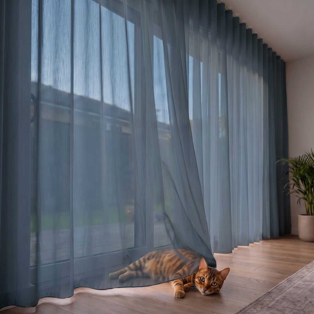 Lucern Sheer Curtain in Harbour, S-fold on a ceiling track