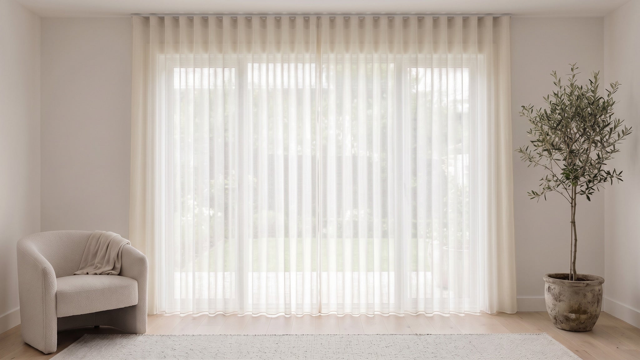 Odin Sheer Curtain in Alabaster, S-fold on a ceiling track