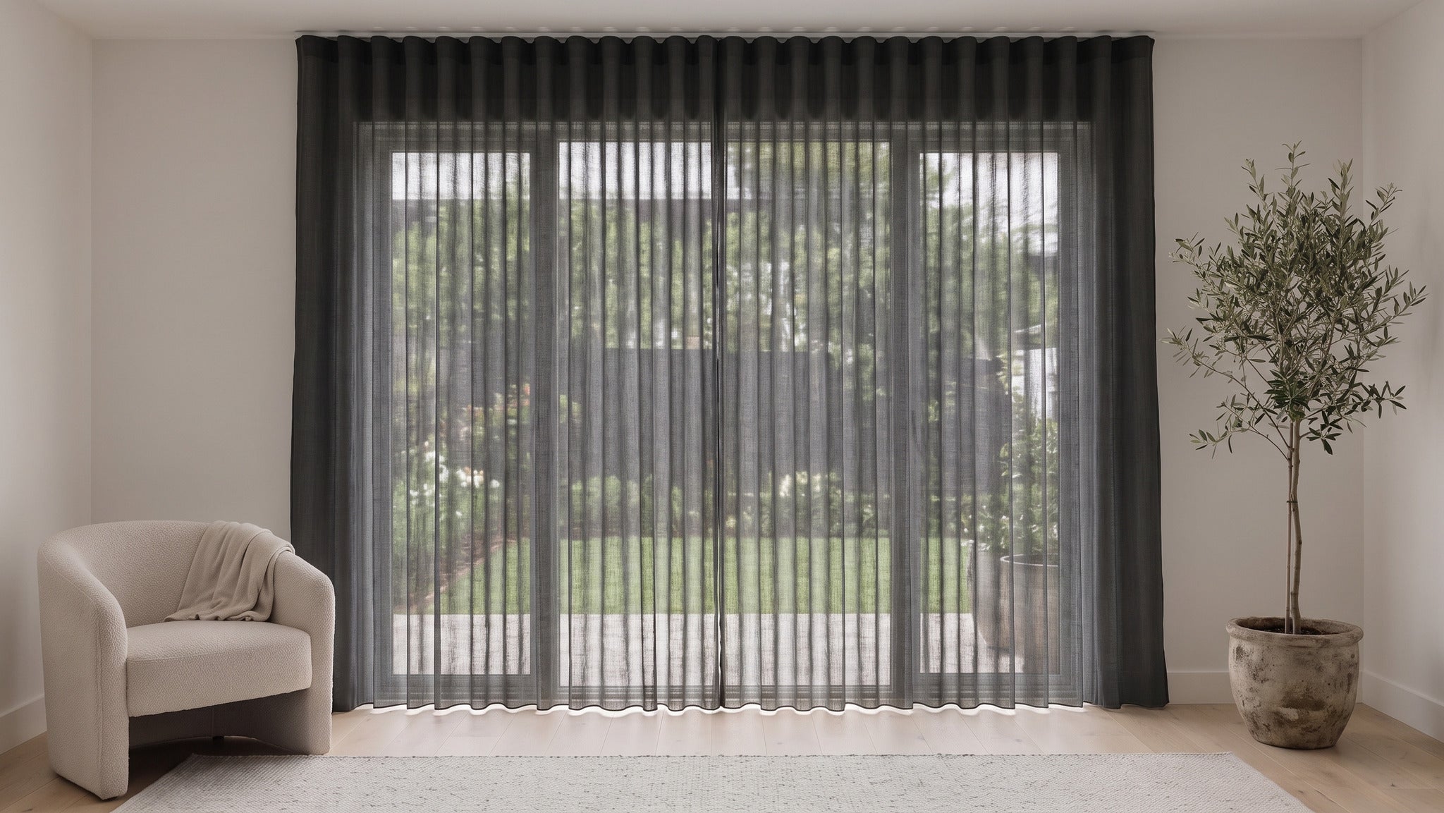 Odin Sheer Curtain in Ebony, S-fold on a ceiling track