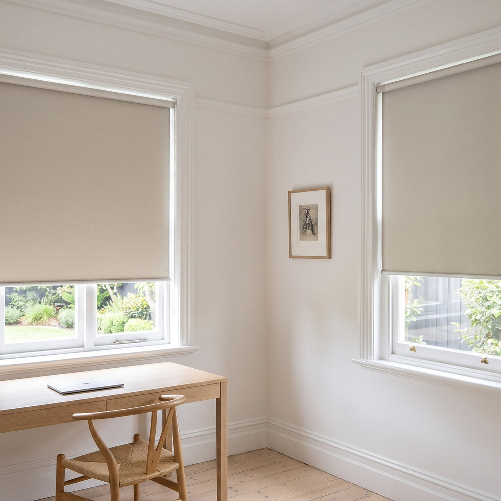 Quest Blockout Roller Blind in Buff, recess fitted in a study window