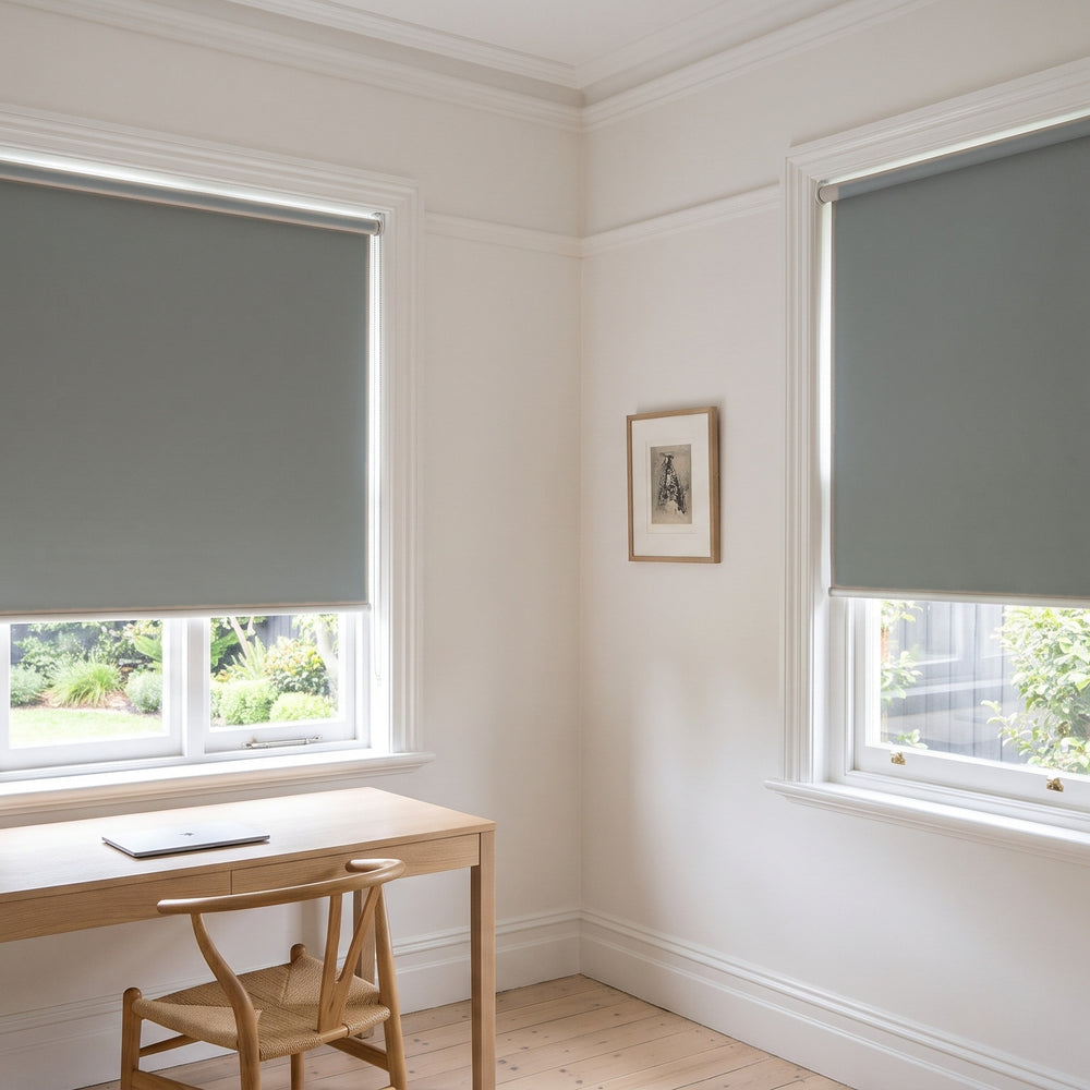 Quest Blockout Roller Blind in Cobblestone, recess fitted in a study window
