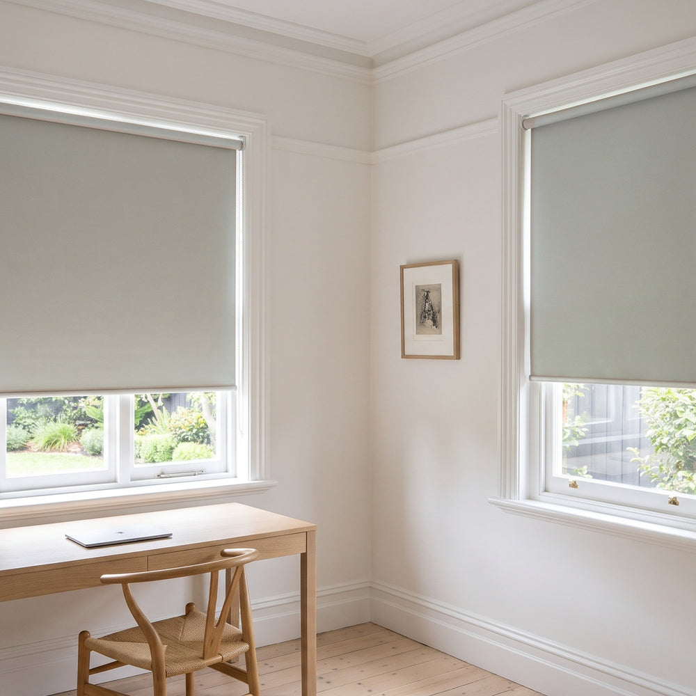 Quest Blockout Roller Blind in Coconut, recess fitted in a study window