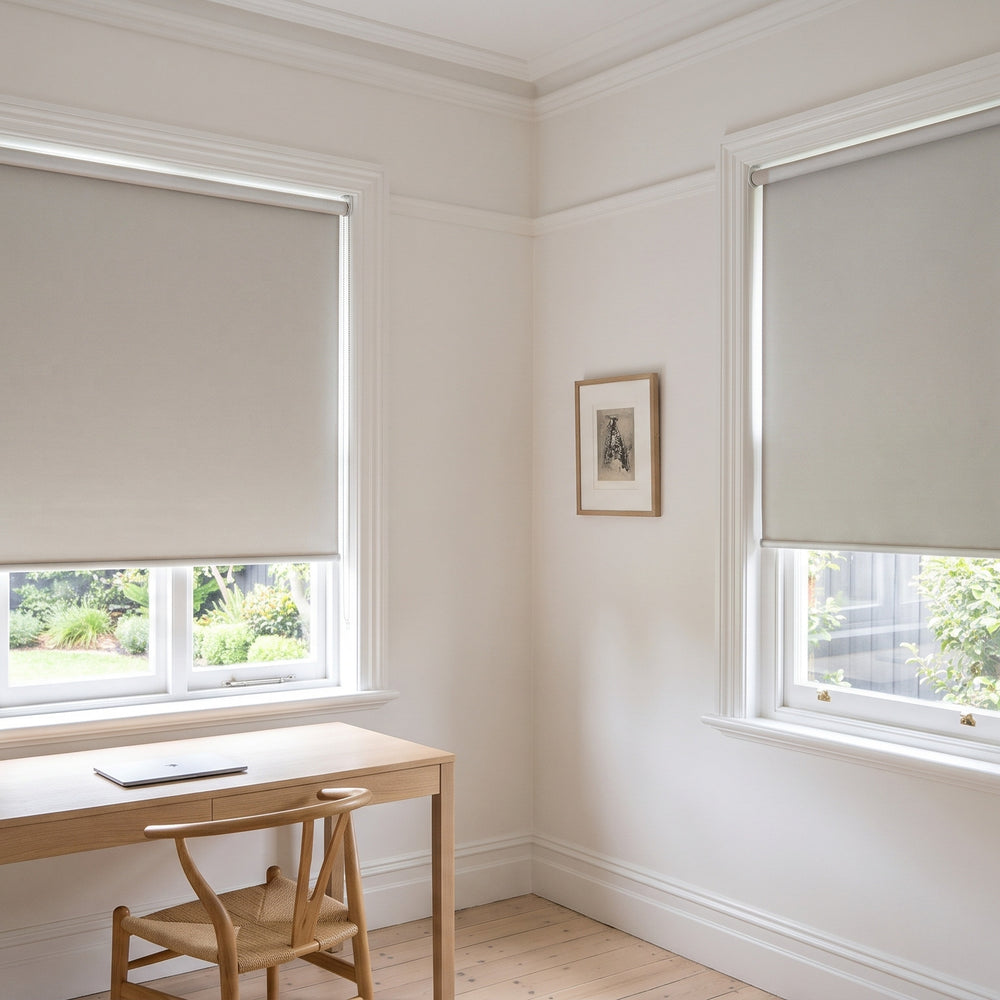 Quest Blockout Roller Blind in Eggshell, recess fitted in a study window
