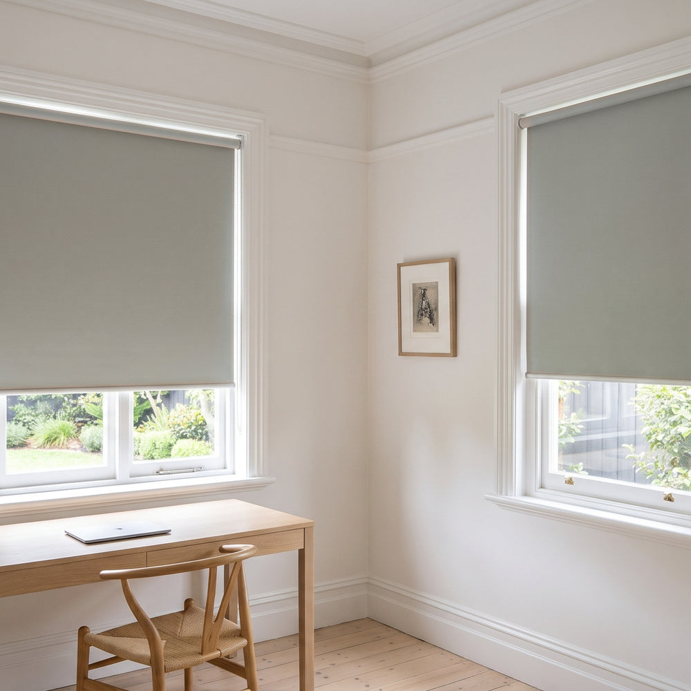 Quest Blockout Roller Blind in Putty, recess fitted in a study window