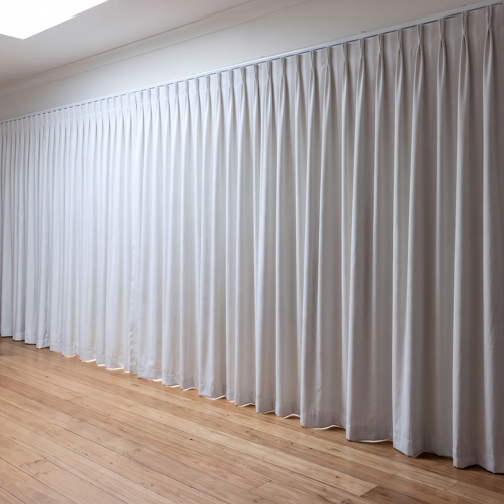 Simplicity Blockout Curtain in Off White, twin pleat on a ceiling track