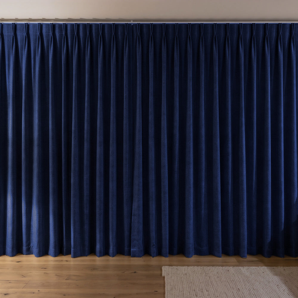 Weylands Blockout Curtain in Indigo, twin pleat on a ceiling track