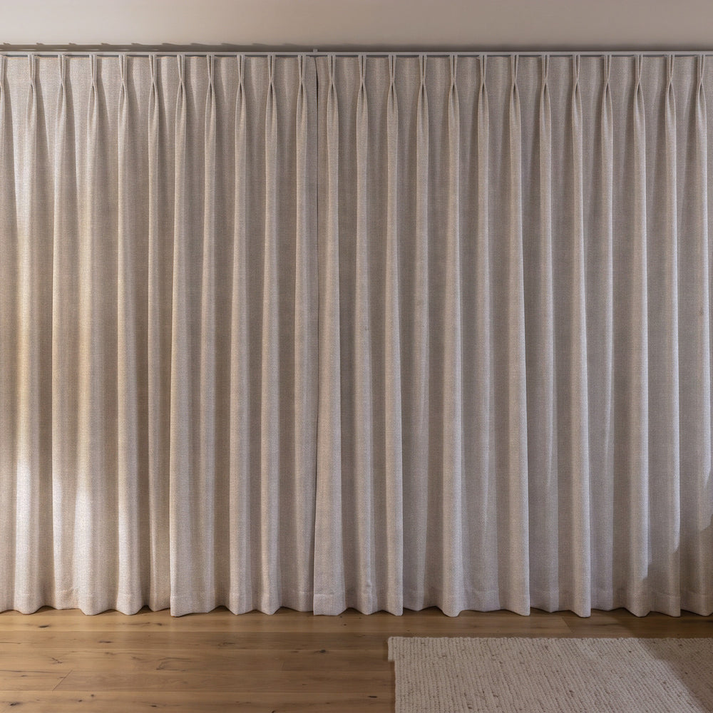Weylands Blockout Curtain in Snow, twin pleat on a ceiling track